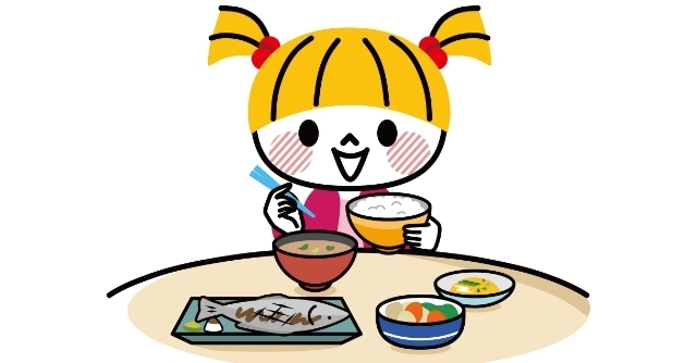 和食を食べる女の子,