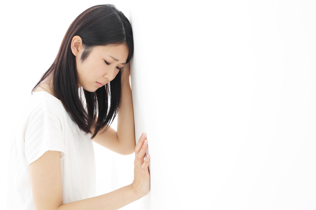 不調に苦しむ女性,妊娠9ヶ月,